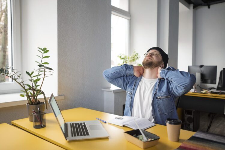 person-getting-break-time-office-scaled-q257hpbg7tj3iai1t85zfntcv9oou647ke9juqnj5a